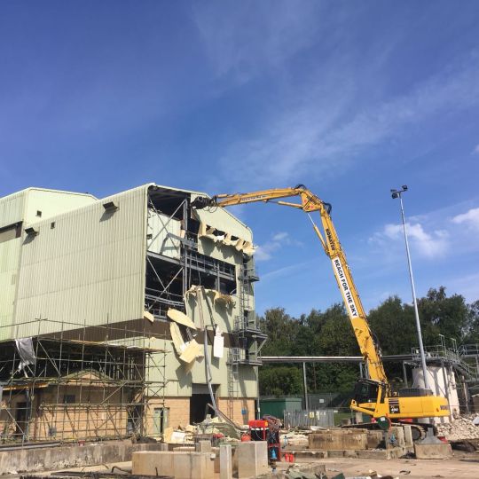 Ron Hull equipment performing a large scale demolition